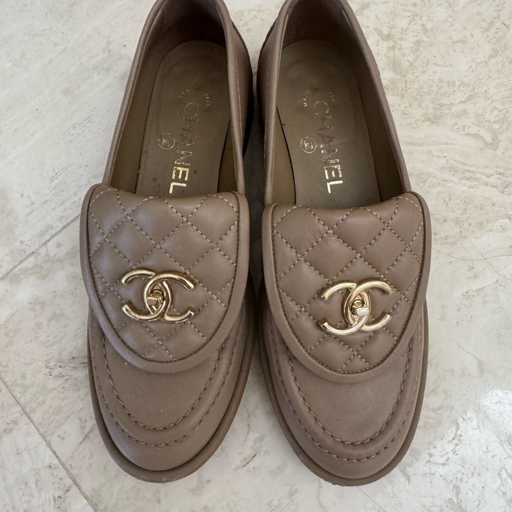 CHANEL Quilted Brown Loafers with Gold Logo